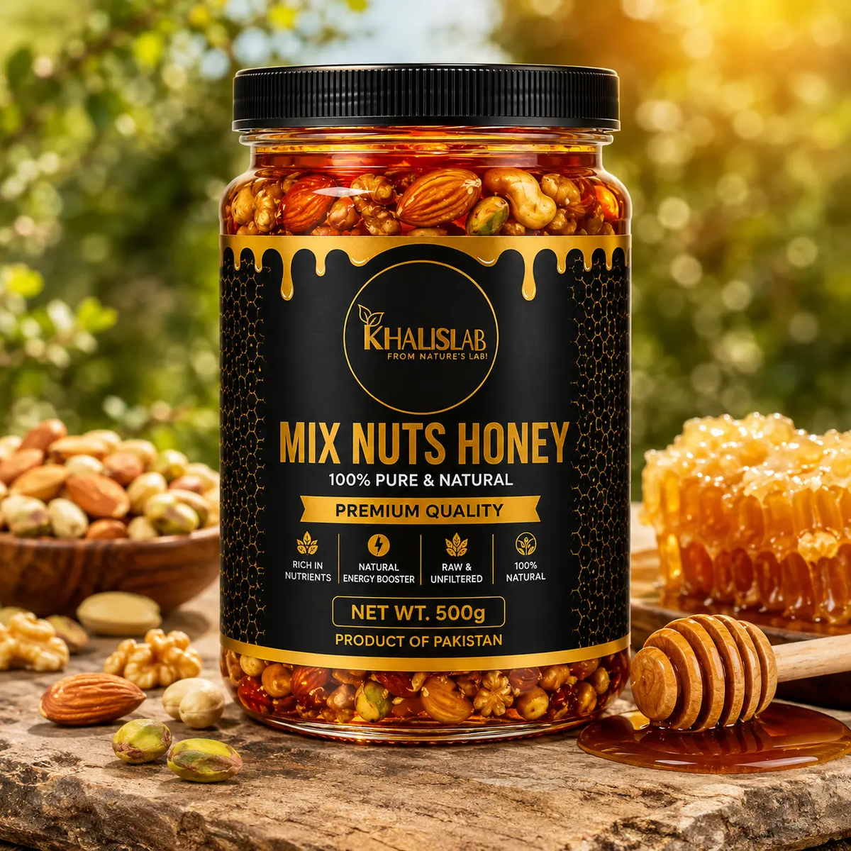 A jar of Khalslab Mix Nuts Honey, 500g, displayed on a rustic stone surface with almonds, pistachios, a honey dipper.